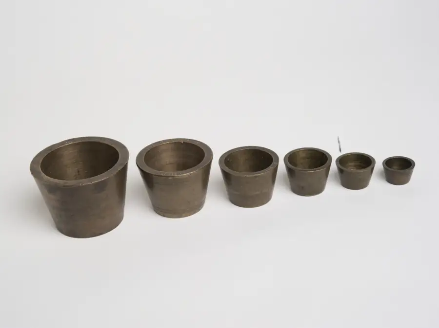 Historic set of brass troy weights