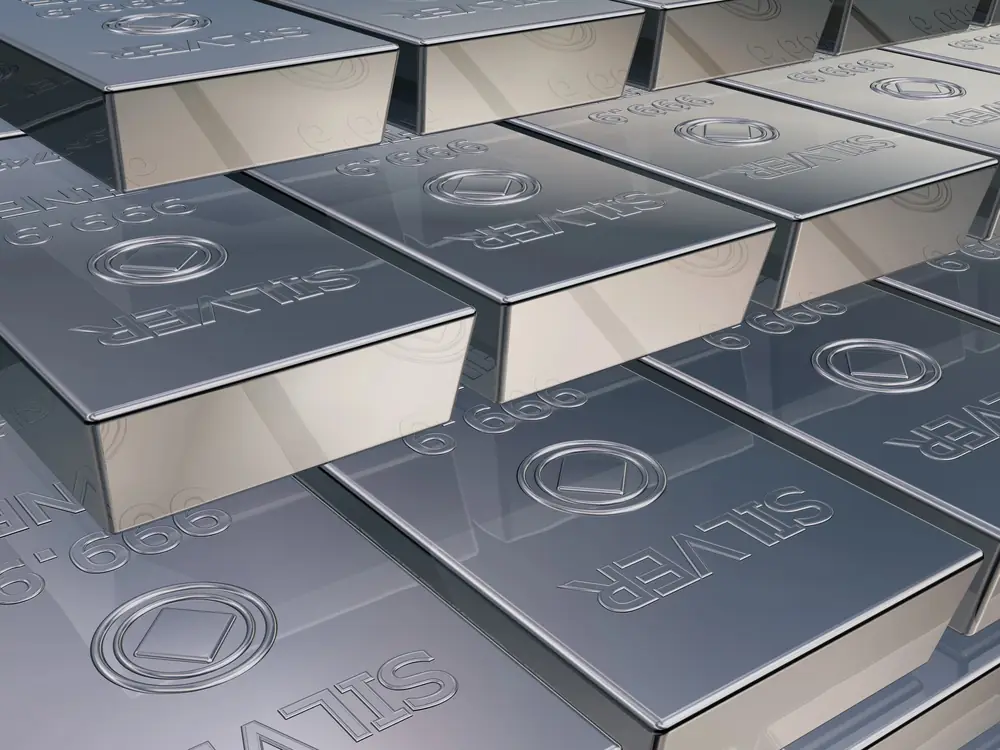 Stack of heavy silver bullion bars