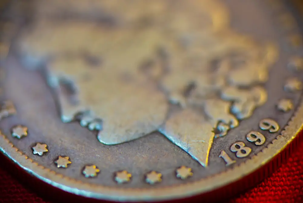 Close-up of a tarnished silver coin